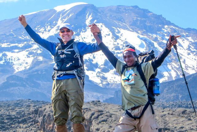 Two happy hikers in Kilimanjaro.