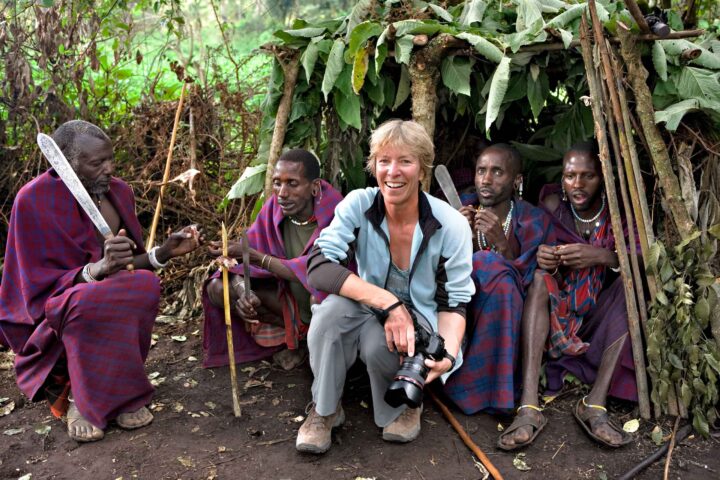 A tourist with locals in Kilimanjaro.