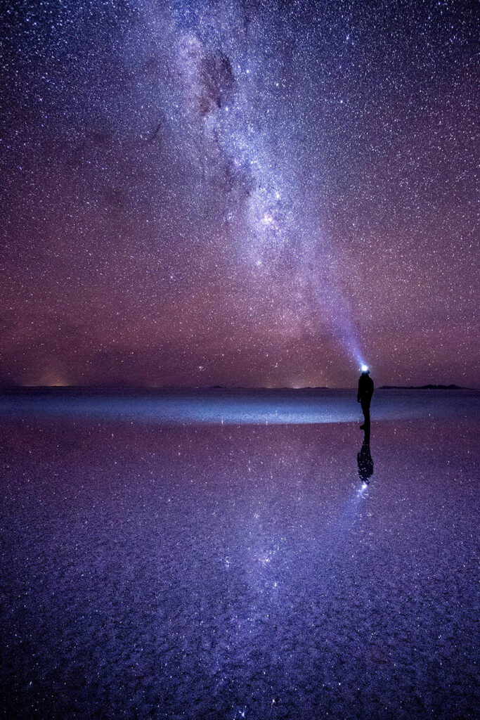 person standing in in Bolivia's Salar de Uyuni