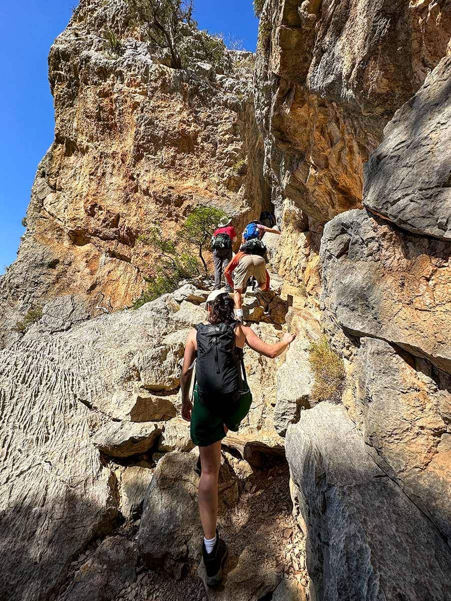 This image has an empty alt attribute; its file name is Corsica-Sardinina-Day-9-Oliena-Dorgali-hikers.jpg